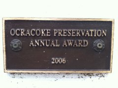 The Historic Preservation Award winners will receive a plaque like this one to hang on their building. This award from 2006 is looking pretty grungy. Who would let that happen?